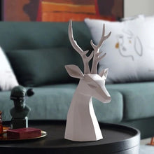 Load image into Gallery viewer, This beautiful Deer Head Bust sculpture is made of resin and comes available in 4 colors of black, white, gray and teal. Measuring 26cm or 10 inches in height and 11.5cm or 4.5 inches in width. This figurine spots a contemporary design with sculptural form inspired by Origami. This decorative piece will add timeless elegance to your space year-round. Perfect for festive tablescapes, mantels and shelves.