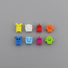 Load image into Gallery viewer, Demon Shape Glass Markers by Allthingscurated are made from high-quality and eco-friendly silicone. Designed in colorful demon shape faces, they look so fun and adorable. Come as a set in 4 designs and 8 different colors. They are the perfect solution for tagging and differentiating drinks for your guests.
