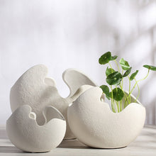 Load image into Gallery viewer, Egg Shell Decorative Pots by Allthingscurated spot an unconventional, egg shape design that looks aesthetically beautiful on its own as an ornamental piece, or full of character as a plant pot for your favorite botanicals. Made of ceramic and comes in 3 different sizes.