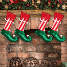Load image into Gallery viewer, Holiday Elf Stocking by Allthingscurated are inspired by the signature curly-toed boots and striped tights that are worn by the little elves. The cute design is both fun and bright in traditional Christmas red and green. They are perfect for adding some jolly cheer to your holiday décor.