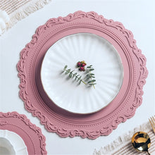 Load image into Gallery viewer, Embossed Lace Round Silicone Placemat by Allthingscurated are expertly crafted from high-quality, food-grade silicone. Available in 7 trendy colors with an embossed lace pattern, this placemat adds texture and charm to your dining table, making your meals more presentable effortlessly stylish.