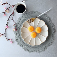 Load image into Gallery viewer, Embossed Lace Round Silicone Placemat by Allthingscurated are expertly crafted from high-quality, food-grade silicone. Available in 7 trendy colors with an embossed lace pattern, this placemat adds texture and charm to your dining table, making your meals more presentable effortlessly stylish.