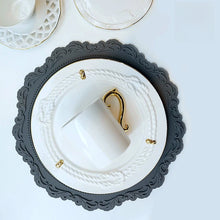 Load image into Gallery viewer, Embossed Lace Round Silicone Placemat by Allthingscurated are expertly crafted from high-quality, food-grade silicone. Available in 7 trendy colors with an embossed lace pattern, this placemat adds texture and charm to your dining table, making your meals more presentable effortlessly stylish.