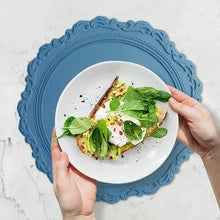 Load image into Gallery viewer, Embossed Lace Round Silicone Placemat by Allthingscurated are expertly crafted from high-quality, food-grade silicone. Available in 7 trendy colors with an embossed lace pattern, this placemat adds texture and charm to your dining table, making your meals more presentable effortlessly stylish.