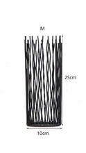Load image into Gallery viewer, Estel Black Wire Candle Holders by Allthingscurated have openwork pattern that resembles willow-like branches in a cylindrical arrangement. Crafted from iron and in black finish, these candle holders come in 3 sizes. Featured here is a medium size measuring 25cm or 9.8 inches in height and 10cm or 4 inches wide.