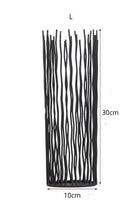 Load image into Gallery viewer, Estel Black Wire Candle Holders by Allthingscurated have openwork pattern that resembles willow-like branches in a cylindrical arrangement. Crafted from iron and in black finish, these candle holders come in 3 sizes. Featured here is a large size measuring 30cm or 11.7 inches in height and 10cm or 4 inches wide.