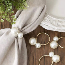 Load image into Gallery viewer, Faux Pearls Napkin Rings in a set of 6 by Allthingscurated are adorned with big and small pearls to create an overall look of elegance and sophistication. They are perfect for special occasions. Come available in 4 different color combinations.