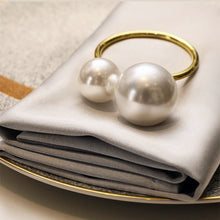 Load image into Gallery viewer, Faux Pearls Napkin Rings in a set of 6 by Allthingscurated are adorned with big and small pearls to create an overall look of elegance and sophistication. They are perfect for special occasions. Come available in 4 different color combinations.