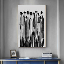 Load image into Gallery viewer, Modern Abstract Figure Art Canvas Print by Allthingscurated featured abstract human silhouettes in black and white is well suited for a contemporary and modern home with a minimalist vibe.