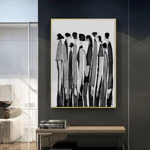 Load image into Gallery viewer, Modern Abstract Figure Art Canvas Print by Allthingscurated featured abstract human silhouettes in black and white is well suited for a contemporary and modern home with a minimalist vibe.