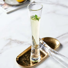 Load image into Gallery viewer, Combining style and functionality, Fion Champagne Flutes by Allthingscurated are hand-crafted from 100% lead-free crystal glass. These elegant flutes boast a sleek, modern, minimalistic design with a weighty base to provide stability and helps to maintain the temperature of your champagne. Comes in a set of 2 or 4 glasses. They are perfect for special occasion and make a stunning wedding gift.