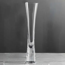 Load image into Gallery viewer, Combining style and functionality, Fion Champagne Flutes by Allthingscurated are hand-crafted from 100% lead-free crystal glass. These elegant flutes boast a sleek, modern, minimalistic design with a weighty base to provide stability and helps to maintain the temperature of your champagne. Comes in a set of 2 or 4 glasses. They are perfect for special occasion and make a stunning wedding gift.
