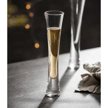 Load image into Gallery viewer, Combining style and functionality, Fion Champagne Flutes by Allthingscurated are hand-crafted from 100% lead-free crystal glass. These elegant flutes boast a sleek, modern, minimalistic design with a weighty base to provide stability and helps to maintain the temperature of your champagne. Comes in a set of 2 or 4 glasses. They are perfect for special occasion and make a stunning wedding gift.