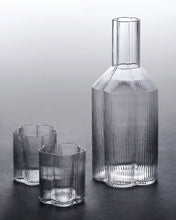 Load image into Gallery viewer, Florentina Drinkware by Allthingscurated embraces a modern design featuring sleek fluted lines with a unique shape reminiscent of a peach blossom flower. Stylish and chic, this collection includes a carafe, goblets and several tumblers, including a glamorous coupe cocktail glass. Add elegance to everyday use with this beautiful collection and just as perfect for setting an extravagant holiday table.