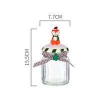 Load image into Gallery viewer, Christmas Festive Storage Jars by Allthingscurated are the perfect jars to keep all your festive treats fresh and delicious. The jars are airtight and each jar is topped with a ceramic lid decorated with a Santa Claus, Christmas Tree, Penguin, Gnome or Fox. Comes in 2 sizes with capacity of 300ml or 10 ounce and 1000ml or 34 ounce. Featured here is a small Fox jar.