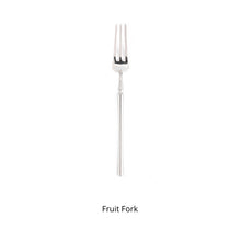 Load image into Gallery viewer, Bright Silver Stainless Steel flatware by Allthingscurated crafted from high-quality stainless steel with a forged construction ensures durability.  It has a bright silver mirror finish that will add a touch of elegance to any meal.  This is a Fruit Fork.
