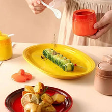 Load image into Gallery viewer, Gradient Colored Seasonings Jar by Allthingscurated come equipped with spoons for convenient access to their contents during cooking and dining. Made from high-quality porcelain, their vibrant colors in gradient tones and stylish design will add a pop of color to your kitchen or dining table, while keeping your herbs, spices and seasonings neatly stored and organized. 8 tasty colors to choose from.