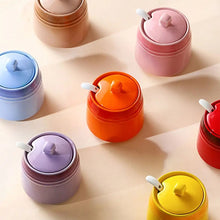 Load image into Gallery viewer, Gradient Colored Seasonings Jar by Allthingscurated come equipped with spoons for convenient access to their contents during cooking and dining. Made from high-quality porcelain, their vibrant colors in gradient tones and stylish design will add a pop of color to your kitchen or dining table, while keeping your herbs, spices and seasonings neatly stored and organized. 8 tasty colors to choose from.