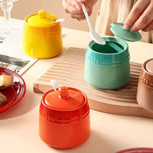 Load image into Gallery viewer, Gradient Colored Seasonings Jar by Allthingscurated come equipped with spoons for convenient access to their contents during cooking and dining. Made from high-quality porcelain, their vibrant colors in gradient tones and stylish design will add a pop of color to your kitchen or dining table, while keeping your herbs, spices and seasonings neatly stored and organized. 8 tasty colors to choose from.