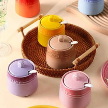 Load image into Gallery viewer, Gradient Colored Seasonings Jar by Allthingscurated come equipped with spoons for convenient access to their contents during cooking and dining. Made from high-quality porcelain, their vibrant colors in gradient tones and stylish design will add a pop of color to your kitchen or dining table, while keeping your herbs, spices and seasonings neatly stored and organized. 8 tasty colors to choose from.