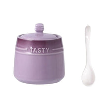 Load image into Gallery viewer, Gradient Colored Seasonings Jar by Allthingscurated come equipped with spoons for convenient access to their contents during cooking and dining. Made from high-quality porcelain, their vibrant colors in gradient tones and stylish design will add a pop of color to your kitchen or dining table, while keeping your herbs, spices and seasonings neatly stored and organized. 8 tasty colors to choose from. Featured here is jar in purple.