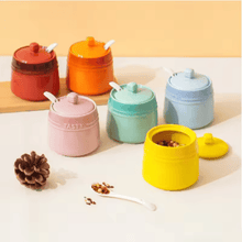 Load image into Gallery viewer, Gradient Colored Seasonings Jar by Allthingscurated come equipped with spoons for convenient access to their contents during cooking and dining. Made from high-quality porcelain, their vibrant colors in gradient tones and stylish design will add a pop of color to your kitchen or dining table, while keeping your herbs, spices and seasonings neatly stored and organized. 8 tasty colors to choose from.