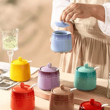Load image into Gallery viewer, Gradient Colored Seasonings Jar by Allthingscurated come equipped with spoons for convenient access to their contents during cooking and dining. Made from high-quality porcelain, their vibrant colors in gradient tones and stylish design will add a pop of color to your kitchen or dining table, while keeping your herbs, spices and seasonings neatly stored and organized. 8 tasty colors to choose from.
