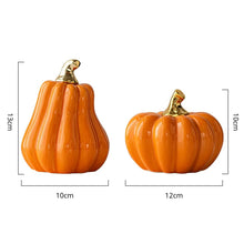 Load image into Gallery viewer, Glazed Ceramic Pumpkins by Allthingscurated spot a sculptural design that are perfect for adding a chic and stylish touch to your Halloween and Thanksgiving celebrations. Available in two designs in orange or white, let these ornamental pumpkins transform your home into a cozy autumn oasis.