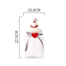Load image into Gallery viewer, Christmas Festive Storage Jars by Allthingscurated are the perfect jars to keep all your festive treats fresh and delicious. The jars are airtight and each jar is topped with a ceramic lid decorated with a Santa Claus, Christmas Tree, Penguin, Gnome or Fox. Comes in 2 sizes with capacity of 300ml or 10 ounce and 1000ml or 34 ounce. Featured here is a large Gnome jar.