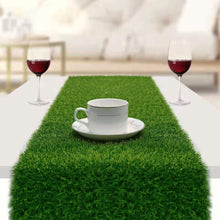 Load image into Gallery viewer, Faux Grass Table Runner by Allthingscurated is the perfect decorative piece to spice up your table settings for spring, summer and easter.  Featuring tufted grass for a realistic look, this runner is a must-have for garden-themed gatherings or outdoor parties. You can also decorate your patio and balcony with this fun and versatile decorative piece for a touch of nature indoor. Comes in 3 different sizes.