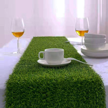 Load image into Gallery viewer, Faux Grass Table Runner by Allthingscurated is the perfect decorative piece to spice up your table settings for spring, summer and easter.  Featuring tufted grass for a realistic look, this runner is a must-have for garden-themed gatherings or outdoor parties. You can also decorate your patio and balcony with this fun and versatile decorative piece for a touch of nature indoor. Comes in 3 different sizes.