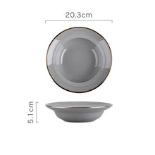 Load image into Gallery viewer, Kovan Ceramic Pasta/Soup Bowl by Allthingscurated is a stylish and functional bowl that offers versatility and practicality in usage. Perfectly sized for pasta, soups, stews, desserts and more. It’s a must-have addition to your dinnerware collection for all occasions from formal dining to everyday casual meals. Featured here is our Kovan Pasta Bowl in gray with gold rim.