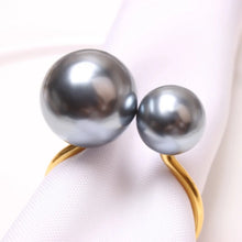 Load image into Gallery viewer, Faux Pearls Napkin Rings in a set of 6 by Allthingscurated are adorned with big and small pearls to create an overall look of elegance and sophistication. They are perfect for special occasions. Come available in 4 different color combinations.
