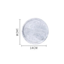 Load image into Gallery viewer, Marble Round Trays by Allthingscurated are crafted from natural marble stone that exude timeless beauty and elegance. The stylish trays are versatile and perfect additions to your home. Use it as a desk organizer, a vanity tray or simply as a serving tray. It holds everything you need with its functionality. Featured here is a gray small tray in 14cm or 5.5 inches.