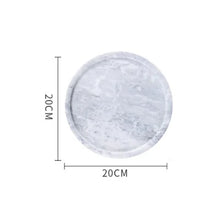 Load image into Gallery viewer, Marble Round Trays by Allthingscurated are crafted from natural marble stone that exude timeless beauty and elegance. The stylish trays are versatile and perfect additions to your home. Use it as a desk organizer, a vanity tray or simply as a serving tray. It holds everything you need with its functionality. Featured here is a gray tray in 20cm or 7.8 inches.