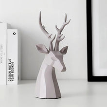 Load image into Gallery viewer, This beautiful Deer Head Bust sculpture is made of resin and comes available in 4 colors of black, white, gray and teal. Measuring 26cm or 10 inches in height and 11.5cm or 4.5 inches in width. This figurine spots a contemporary design with sculptural form inspired by Origami. This decorative piece will add timeless elegance to your space year-round. Perfect for festive tablescapes, mantels and shelves. This is a deer head bust in Gray.
