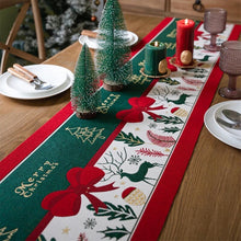 Load image into Gallery viewer, Holiday Bow and Elk Table Runners by Allthingscurated are inspired by all the notable symbols of Christmas like the merry bow, Christmas tree, elk and snowflakes. The jacquard table runners come in vibrant hues of blue and green with beautiful embroidery and complete with pretty tassels. Available in 9 sizes. They are perfect holiday decoration to bring a festive touch to. Your table setting.