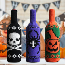 Load image into Gallery viewer, Halloween Knitted Wine Bottle Sleeves by Allthingscurated come in 3 trendy design of a skull, spider and pumpkin. They are are great way to dress up your wine bottles for quick Halloween makeover for your home and dining table.