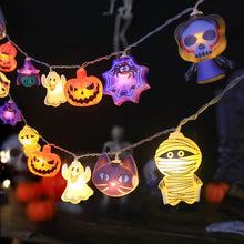 Load image into Gallery viewer, Halloween LED Party Lights by Allthingscurated featuring playful mummies, pumpkins, ghosts, skeletons and spiders add a fun and festive touch to your Halloween décor. The warm glow of the LEDs enhances the eerie ambiance, making your space perfect for Halloween celebrations and parties. Comes in 2 lengths and battery-powered.