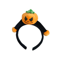 Load image into Gallery viewer, Featuring 3 cute designs, Plush Halloween Headbands by Allthingscurated blend comfort with style. They add a charming touch to your costume and create joyful photo moments to capture the festive spirit.
Seen here is the Orange Pumpkin design headband with black face on a white background.
