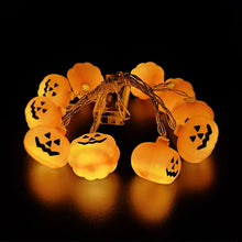 Load image into Gallery viewer, Halloween Pumpkin LED String Lights by Allthingscurated instantly illuminate your home with a warm, inviting glow. With easy installation, these lights instantly update your home décor and effortlessly add a spooky touch to your space.