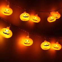 Load image into Gallery viewer, Halloween Pumpkin LED String Lights by Allthingscurated instantly illuminate your home with a warm, inviting glow. With easy installation, these lights instantly update your home décor and effortlessly add a spooky touch to your space.