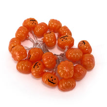 Load image into Gallery viewer, Halloween Pumpkin LED String Lights by Allthingscurated instantly illuminate your home with a warm, inviting glow. With easy installation, these lights instantly update your home décor and effortlessly add a spooky touch to your space.