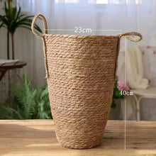 Load image into Gallery viewer, Hayden Tall Planters by Allthingscurated come in 3 sizes. Hand-woven using natural seagrass and comes with handles for easy transportation. Featured here is a large size planter measuring height 15.6 inches and diameter of 23cm or 9 inches.40cm or