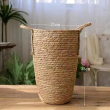 Load image into Gallery viewer, Hayden Tall Planters by Allthingscurated come in 3 sizes. Hand-woven using natural seagrass and comes with handles for easy transportation. Featured here is a medium size planter measuring height of 35cm or 13.7 inches and diameter of 21cm or 8.2 inches.