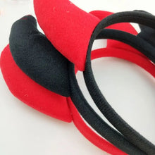 Load image into Gallery viewer, Horn Shape Headband by Allthingscurated features trendy, three-dimensional horns that is fun and perfect for elevating your Halloween party look. This accessory is perfect for adding a playful touch to your costume and make a statement at any Halloween party. Comes in 3 colors.
