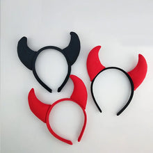 Load image into Gallery viewer, Horn Shape Headband by Allthingscurated features trendy, three-dimensional horns that is fun and perfect for elevating your Halloween party look. This accessory is perfect for adding a playful touch to your costume and make a statement at any Halloween party. Comes in 3 colors.