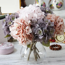 Load image into Gallery viewer, Silk Hydrangeas by Allthingscurated are made of premium quality silk that feature realistic looking flowers that are perfect for home décor and wedding venue decoration. Create a stunning display with 8 lovely colors available and add a touch of beauty and elegance to any space.