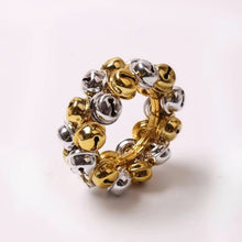 Load image into Gallery viewer, Jingle Bells Napkin Rings by Allthingscurated. Come as a set of 6 rings in color combos of red and green, or silver and gold, they are the perfect finishing touch for your holiday table setting. Spread the joy of Christmas and charm your guests with the cheerful bells.