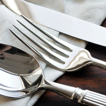 Load image into Gallery viewer, Julius Silver Stainless Steel Flatware Sets by Allthingscurated are crafted from high-quality 18/10 stainless steel. The weighty and solid construction provides a luxurious feel, while the Roman column handle design adds a touch of elegance. The mirror polished surface reflects a bright and shiny finish, adding a touch of sophistication to any table.
